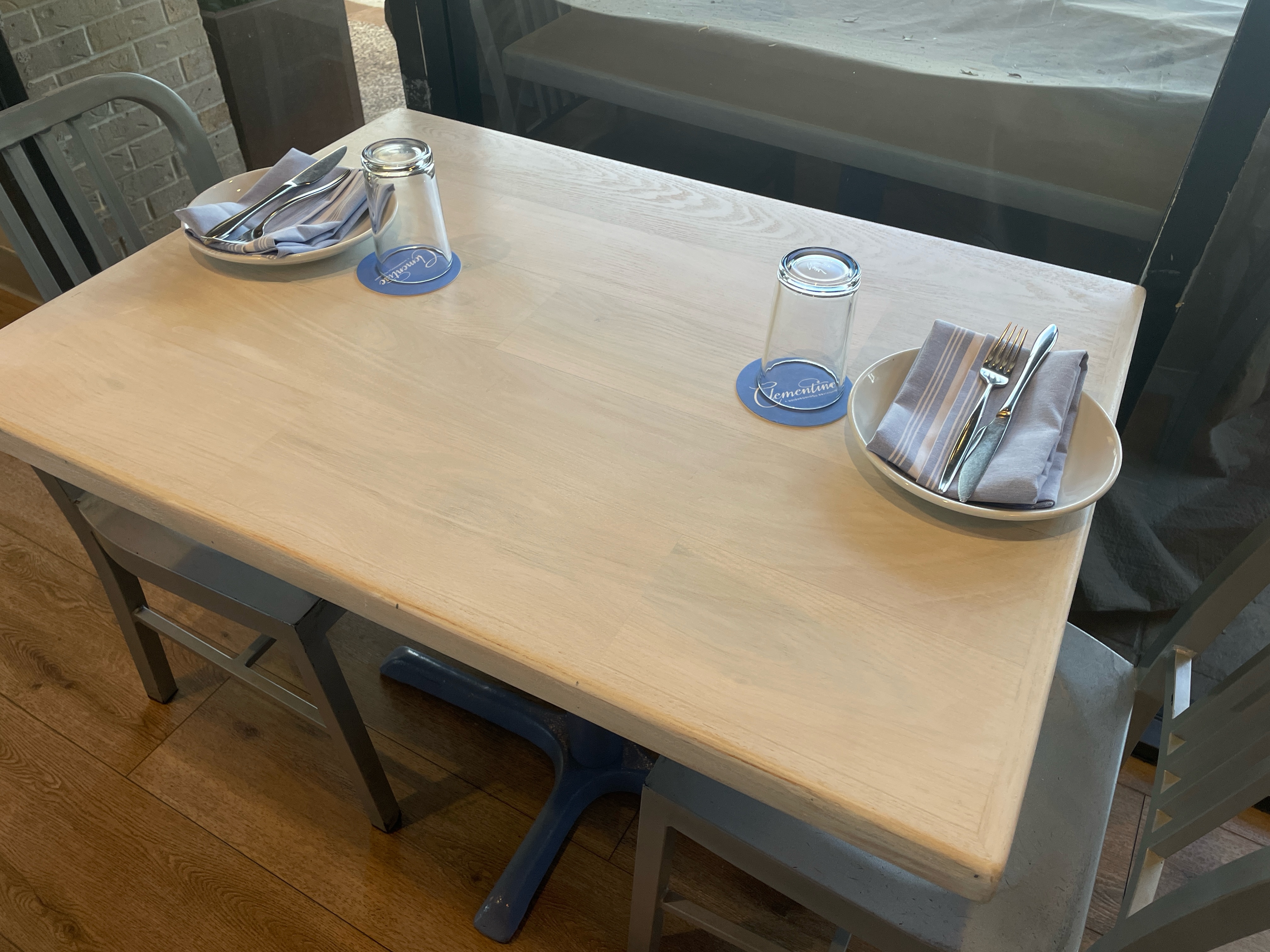 Two-top table refinished to bare wood and re-sealed at Clementine